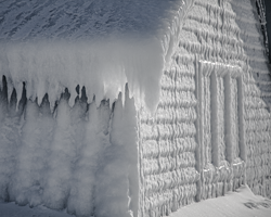 Wind, temperature, and rain combine to wrap this gift shop in a sparkling winter blanket.