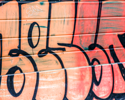 Bold, puffy letters form organic body shapes in this mural.