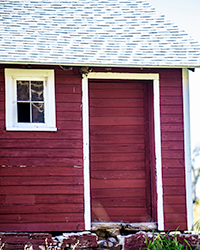 Is a door still a door with no doorknob, no steps, and no visitors except nesting swallows?